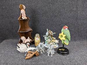 lot 622 image: Lot of Collectibles and Home Dcor - Shelf measures 19-34 tall - NO SHIPPING