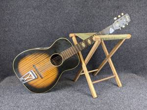 lot 677 image: Stella Guitar and Camp Stool - NO SHIPPING