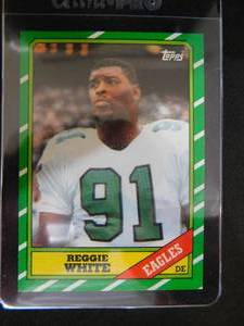 lot 92 image: 1986 Topps Reggie White Rookie Card #275