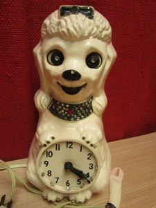 lot 352 image: VINTAGE POODLE CLOCK