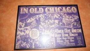 lot 36 image: Framed  Plexiglass In Old Chicago Poster--21Wide  x  14 14 Tall