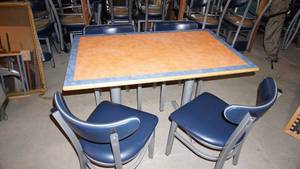 lot 15 image: Commercial Size Table W Four Chairs--Table Is 46 Long x  28 Wide  x  30 Tall