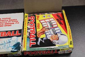lot 72 image: Vintage Deadstock 1984 Topps Football Sticker Book Case Lot  2 Cases