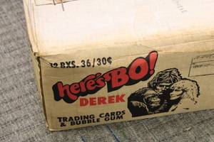 lot 75 image: 1981 Fleer Heres Bo Derek Sealed Case Of 12 Boxes