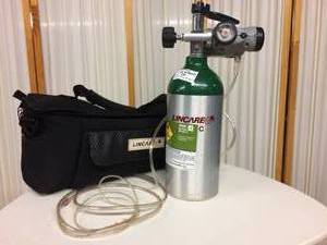 lot 35 image: Lincare M-9C Oxygen Therapy O2 Cylinder with Bag