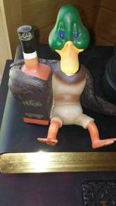 lot 4 image: Drunk duck doorstop or decoration.