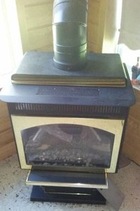 lot 5 image: Gas Fireplace with chimney. THURSDAY REMOVAL