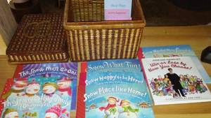 lot 14 image: Childrens books in great wicker basket