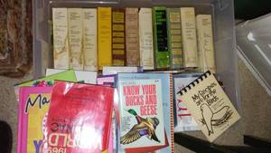 lot 15 image: Books in tote with cover
