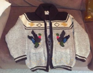 lot 27 image: Vintage wool zip sweater.