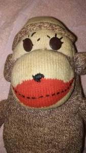 lot 66 image: Sock monkey 14 inches.
