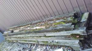 lot 111 image: Stack of lumber. 4x4s and 2x8s