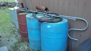 lot 117 image: (2) propane tanks, (3) barrels and more.