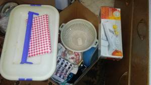 lot 137 image: Glass serving bowls, grating tool, plastic storage.