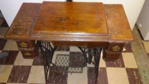 lot 158 image: Treadle sewing machine and wood cabinet. Very nice.