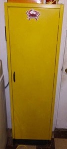 lot 164 image: Gold, metal cabinet with contents.