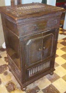 lot 181 image: Allens Parlor Furnace. Wood burning antique, with chimney pipe.