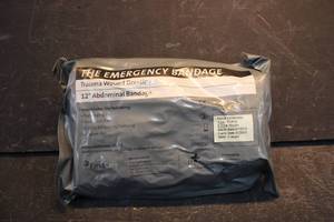 lot 125 image: The Emergency Bandage, Trauma Wound Dressing, and 12 Abdominal Bandage