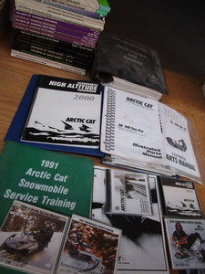 Arctic Cat parts & service books...