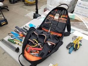 lot 425 image: Klein Tools Tool Bag  with Ball Peen Hammer, Slide Lock Pliers, Wire Cutters, Glass Cutter, Screwdriver Set, Pry Bar