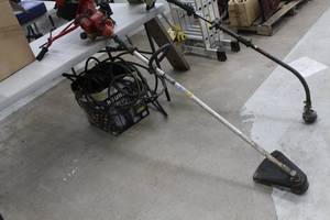 lot 474 image: Homelite 17 Line Trimmer, gas
