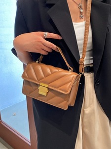 lot 5 image: Quilted Flap Square Bag
