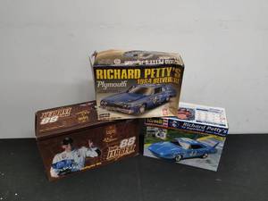 lot 30 image: Two Vintage Model Cars- Dale Jarrett Racecar & Two Richard Petty Cars