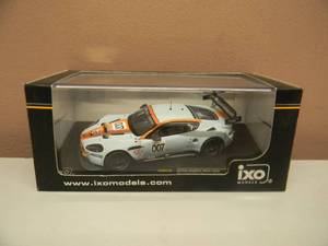 lot 28 image: 143 SCALE IXO MODELS ASTON MARTIN DBR9 #007 LM 2008 PRESENTATION VERSION - NEW IN BOX - GREAT PIECE - SEE PICTURES