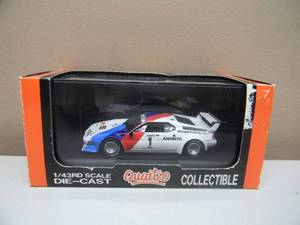 lot 37 image: 143 SCALE QUARTZO BMW M1 PROCAR M.ANDRETTI MONZA 1979 - NEW IN BOX - GREAT PIECE - SEE PICTURES