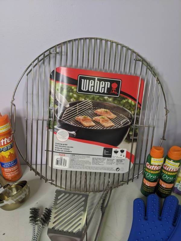 lot 50 image: New Weber Grill Grate, Cutter Insect Repellent, Char-Broil Grill Utensils, Silicone Oven Mitts, Babyganics Sunscreen and Insect Repellent, Organic Lavender Grow Kit, and more