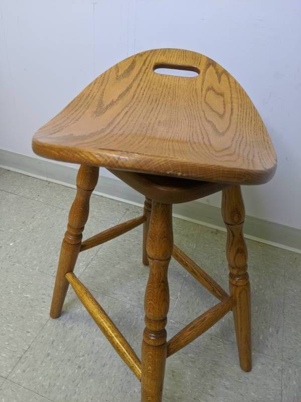 lot 911 image: Unique Lot of (2) Oak Saddle Barstools