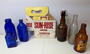 lot 288 image: Vintage Glass Bottle Lot & Vintage Sun-Rise Multi Pack Carton