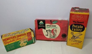 lot 279 image: Great Vintage Kitchen Feemsters Famous Vegetable Slicer, White Mountain Apple Parer Core & Slicer, Mrs. Damars Potato Cutter in Original Boxes