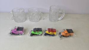 lot 158 image: Vintage McDonalds Glass Collectable Batman Forever Mugs, Kelloggs Matchbox Cars in Packaging