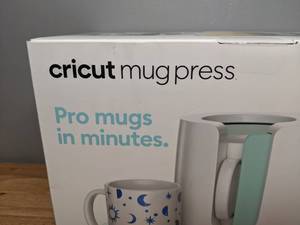 lot 10 image: Brand New Cricut Mug Press