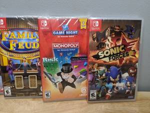 lot 20 image: Set of 6 Brand New Nintendo Switch Video Games Sonic Assassins Creed WWE Big Buck Hunter