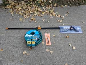 lot 445 image: All New Yard Work Lot - 50 Hose, Fiskars Pruning Stik Tree Pruner, Fiskars Herb Snip Shears - NER