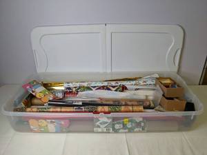 lot 442 image: Lot of Gift Wrapping Paper with Storage Bin