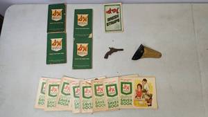 lot 170 image: Vintage Pluck Mini Toy Gun with Holster and 13 S&H Green Stamps Books