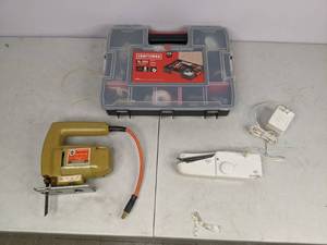 lot 631 image: Power Tool Lot - Black & Decker Jigsaw, Craftsman Toolbox and Contents, Mini Portable Sewing Machine
