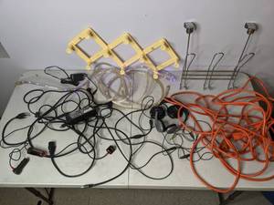lot 622 image: Lot of Misc Cables, Rope Lights, Wall Hooks, and Headphones