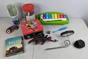 lot 512 image: Lot of a Little of Everything Xylophone, Homedics Head Massager and Much More  NER