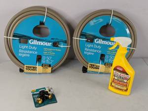lot 584 image: New Outdoor Lawn Care Lot - (2) 50 Hoses, Dr. Earth Organic Outdoor Insect Killer, 2-Way Shut Off Valve - NER