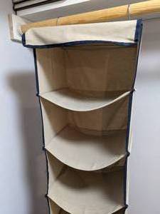 lot 978 image: Hanging Tan Cloth Shoe Rack