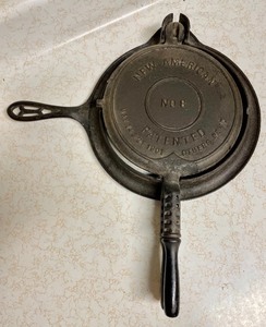 lot 126 image: Cast Iron Pan and Waffle Maker