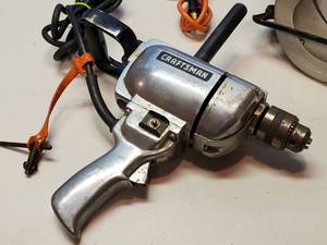 lot 256 image: Black & Decker Circular Saw & Craftsman 12 Reversible Drill