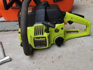 lot 261 image: Poulan Chainsaw in a Husqvarna Storage case
