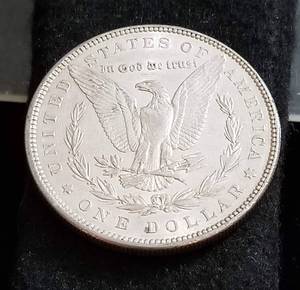 1886 MORGAN SILVER DOLLAR AU