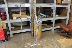 lot 935 image: Lot of (2) Metal Rolling Clothing Racks