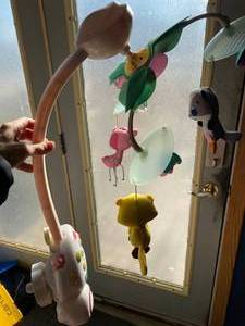 lot 36 image: Baby mobile for crib lightly used w...